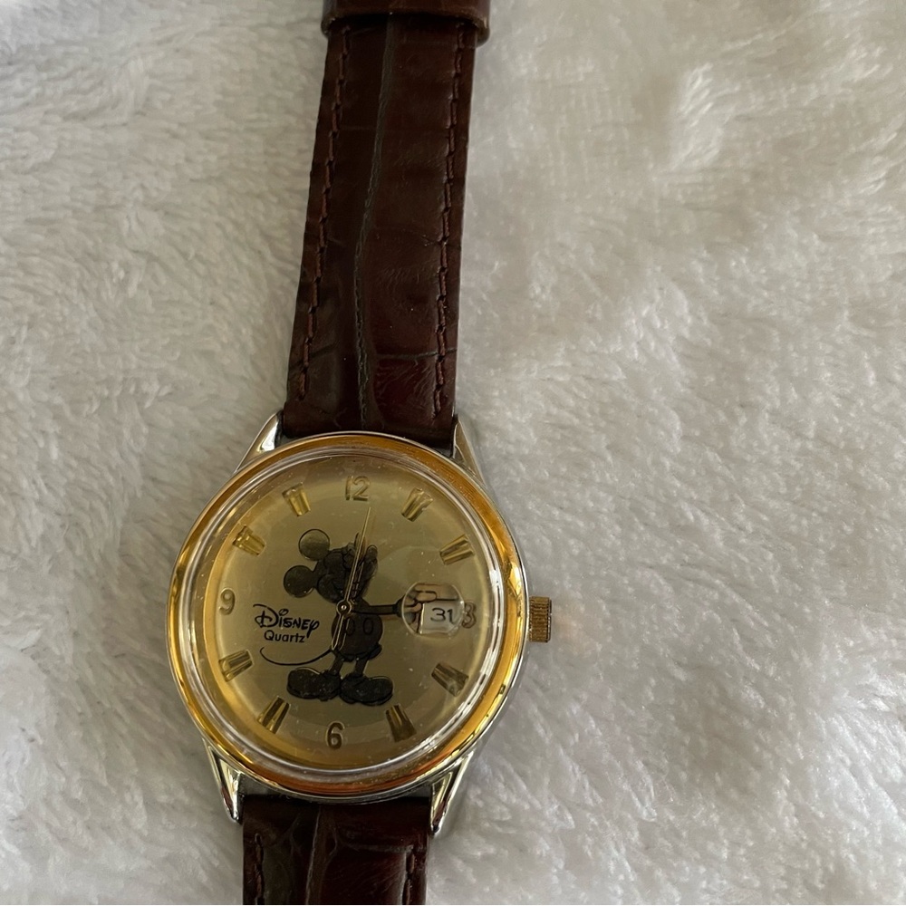 Disney Time Works Mickey Mouse Watch with date, embossed, genuine, leather band.